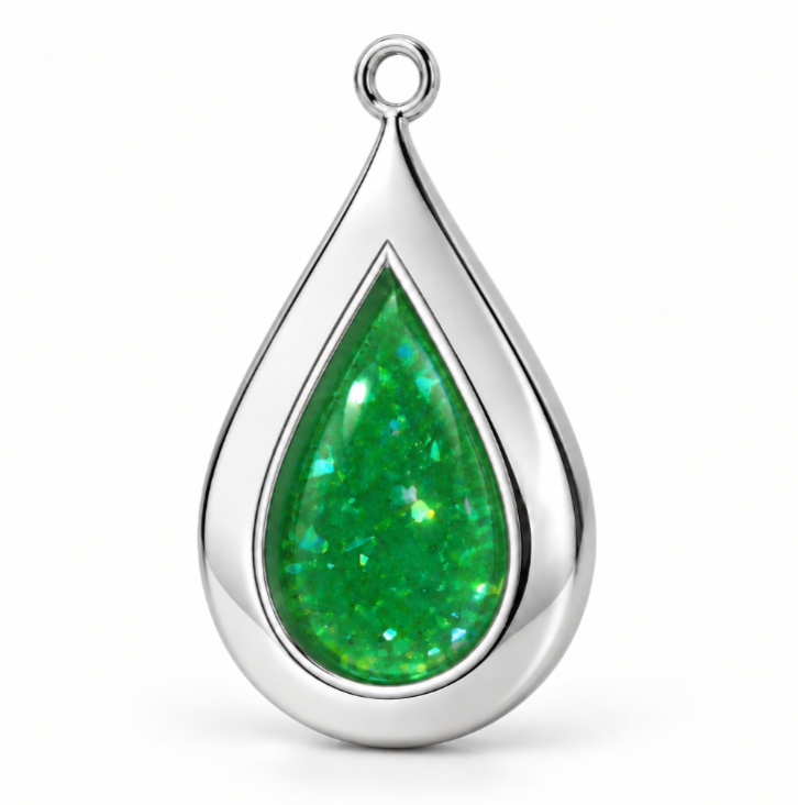 The Teardrop silver pendant in Emerald Dream memorial resin