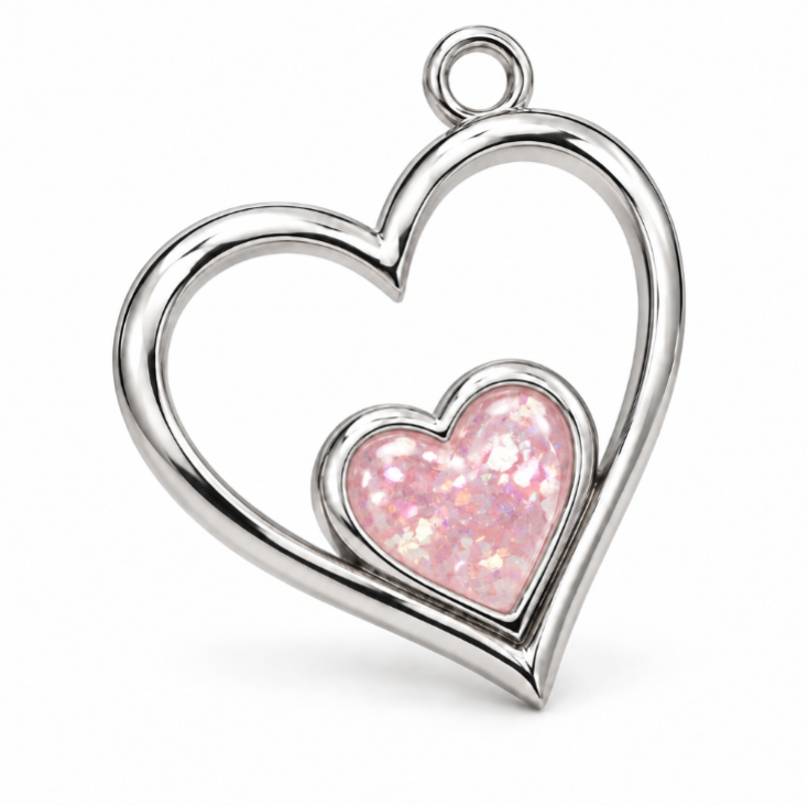 Heart to Heart silver pendant with a small pink memorial resin heart inside an open heart
