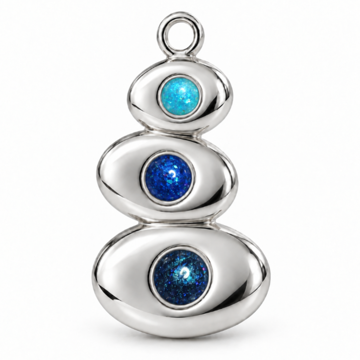 The Cairn silver pendant with three stacked stones set in blue memorial resins