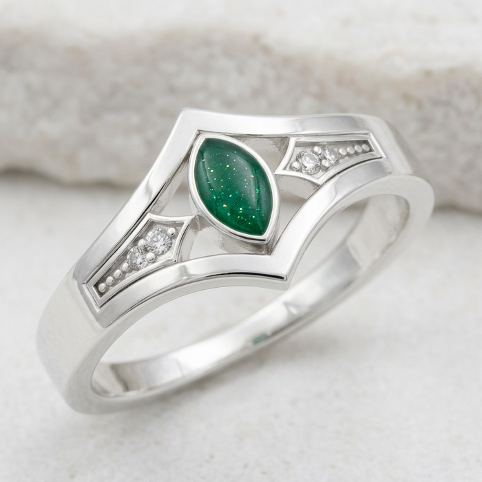 Angular marquise ring concept in Emerald Green on white stone