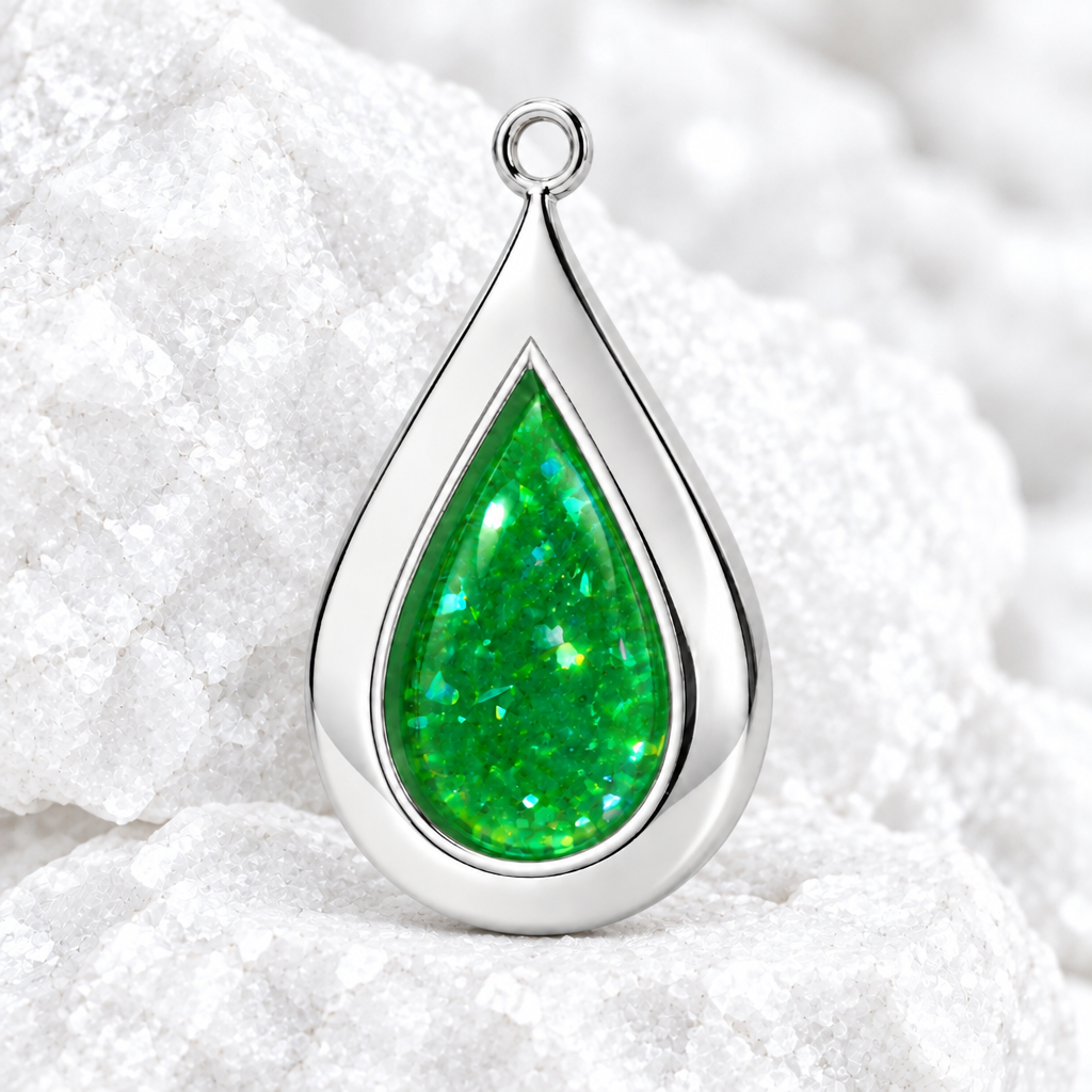 The Teardrop pendant on bright white textured rock