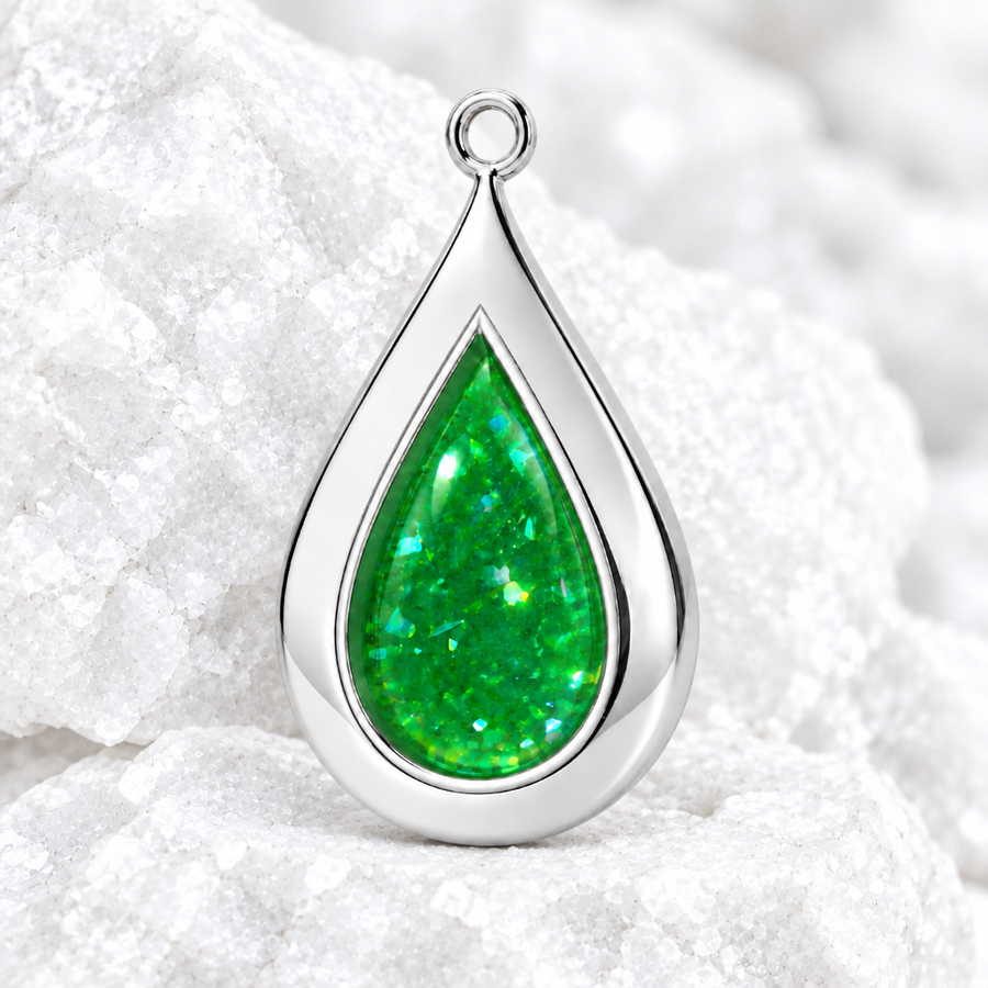 The Teardrop pendant on bright white textured rock