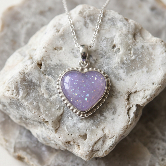 Violet Moon Beaded Heart Pendant on softly textured light linen